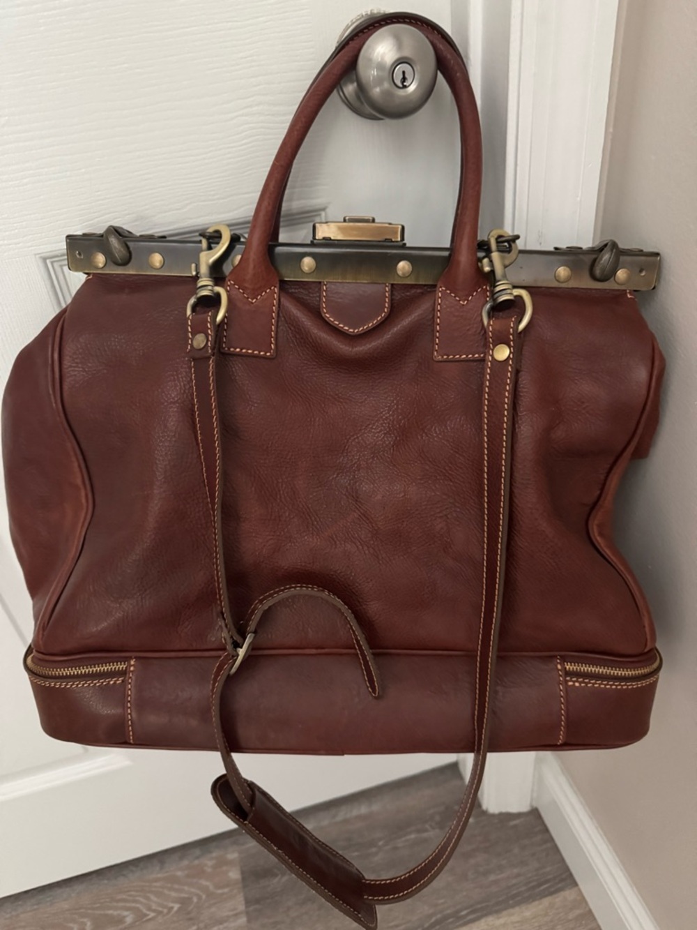 Men's Brown Leather Duffel Bag with Classic Frame Closure